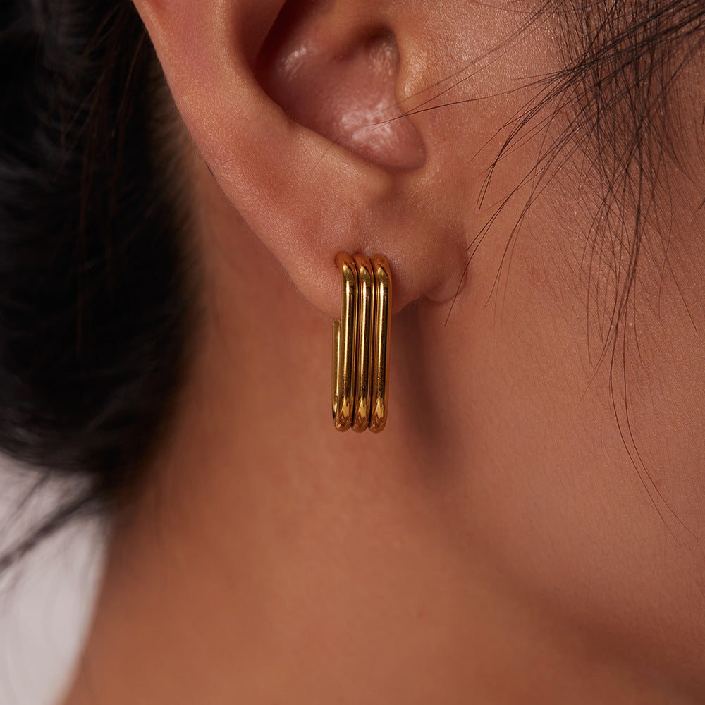 Boucles d'oreilles créoles ovales dorées en acier inoxydable
