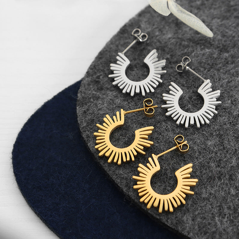 Boucles d’oreilles demi soleil